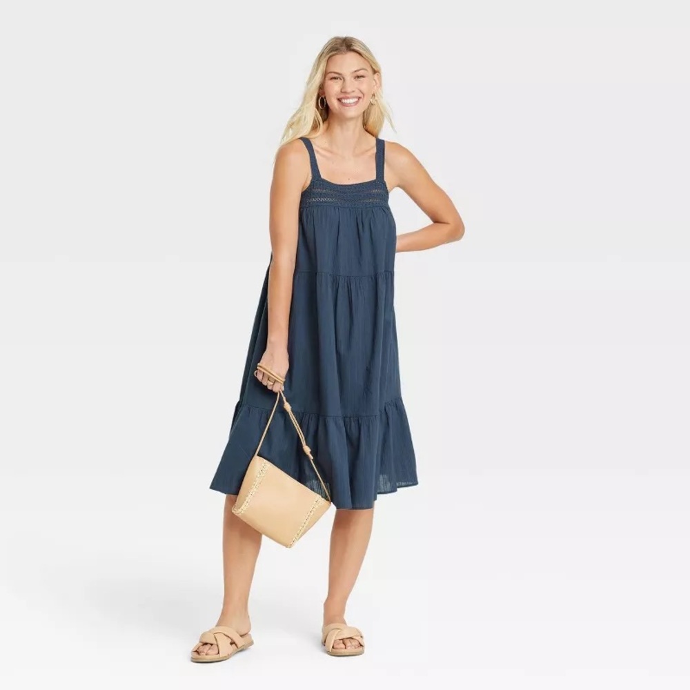 Pretty bohemian 100% cotton sleeveless dress with crochet sleeves and neck.